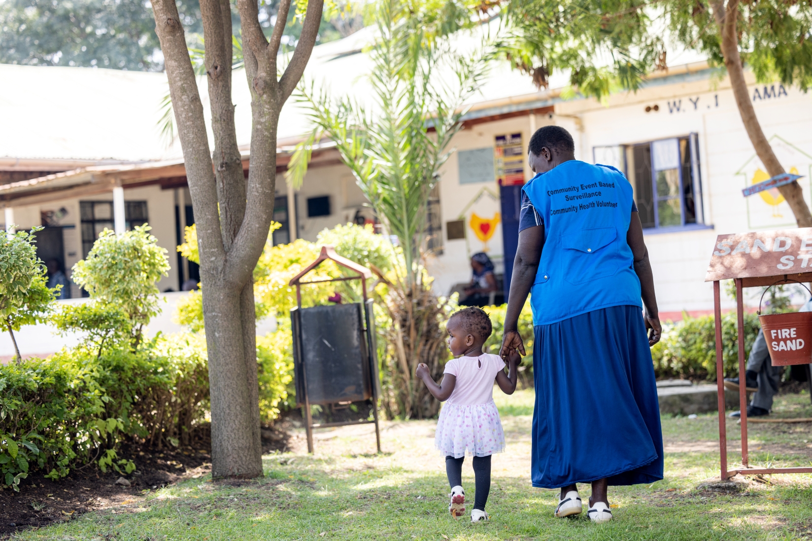 Adult and toddler in Kenya