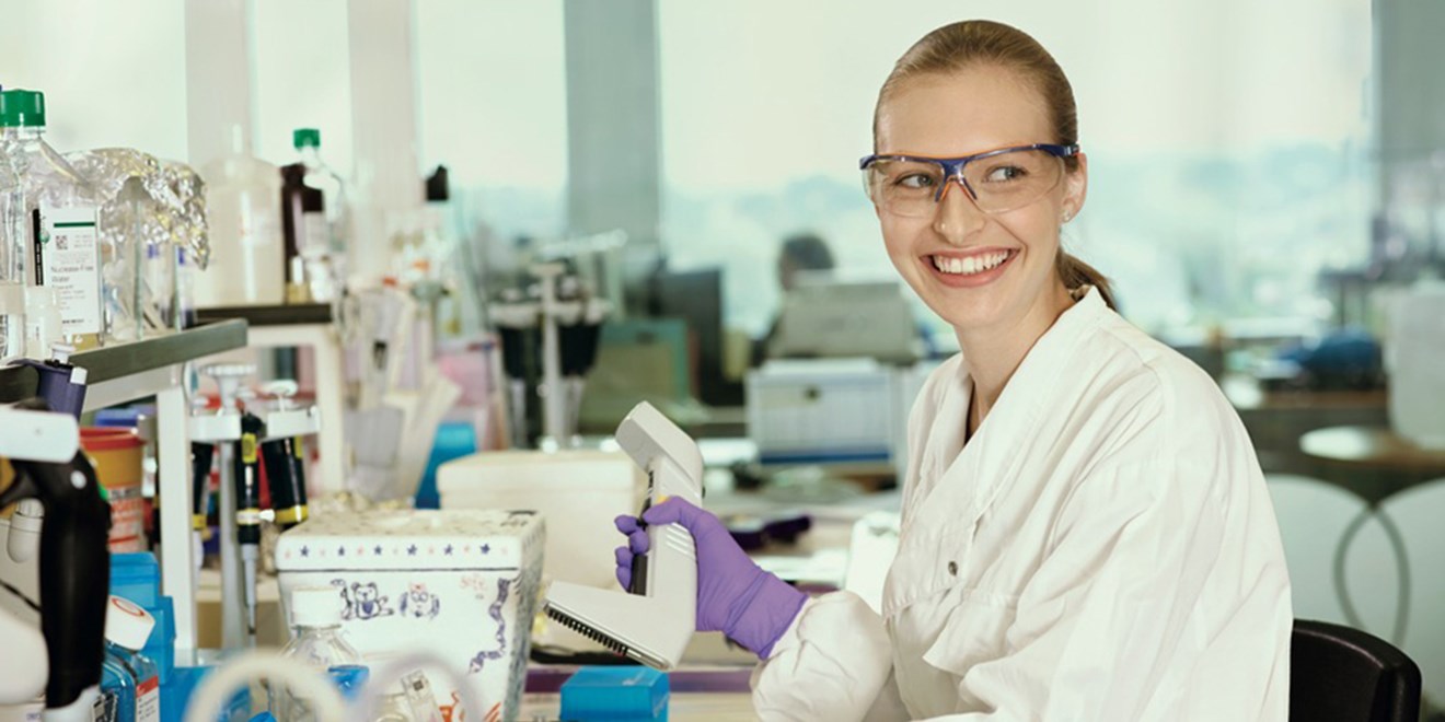 female scientist working in Stevenage research and development lab