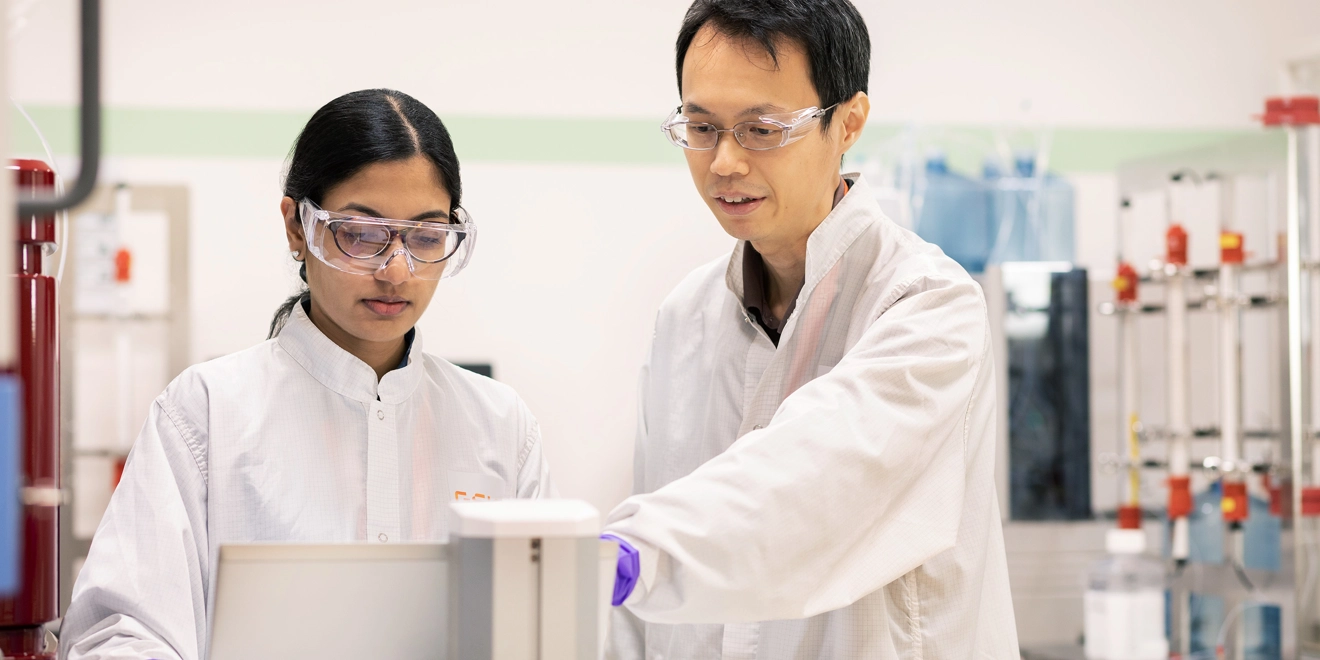 Manufacturing Image Two People Working