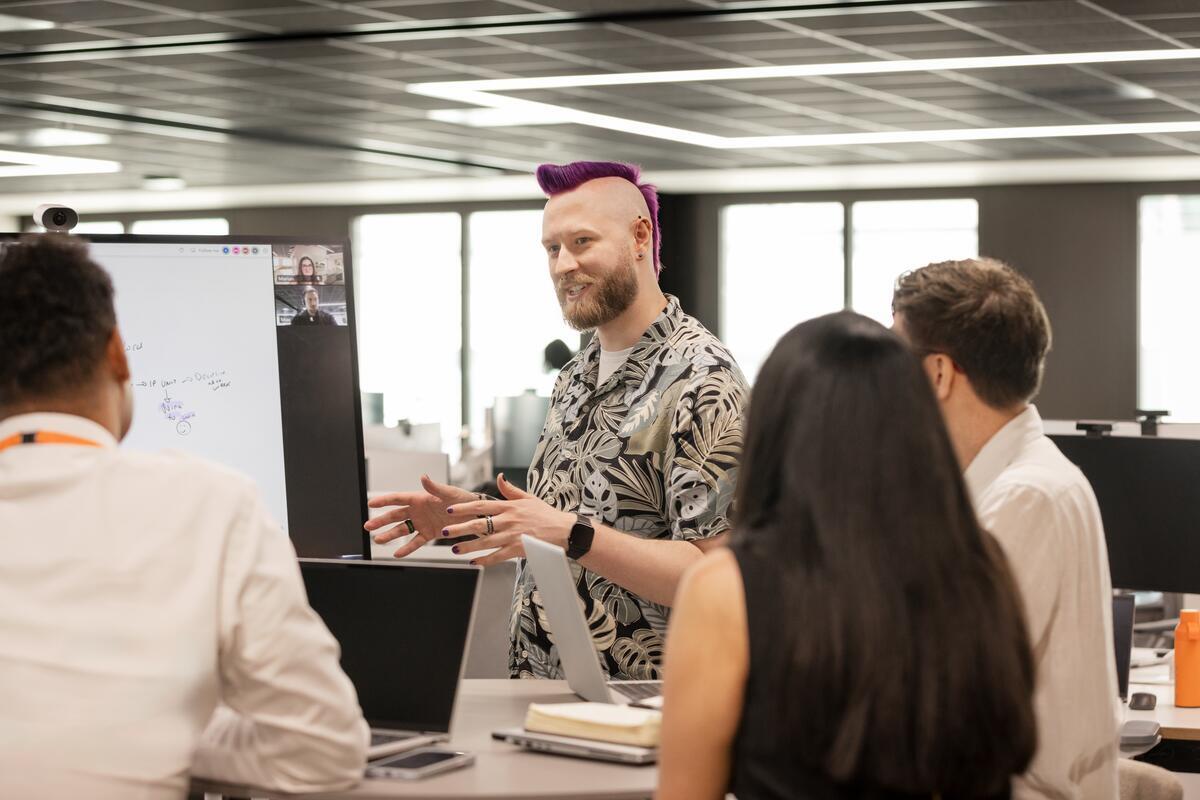 experienced professionals working at a desk