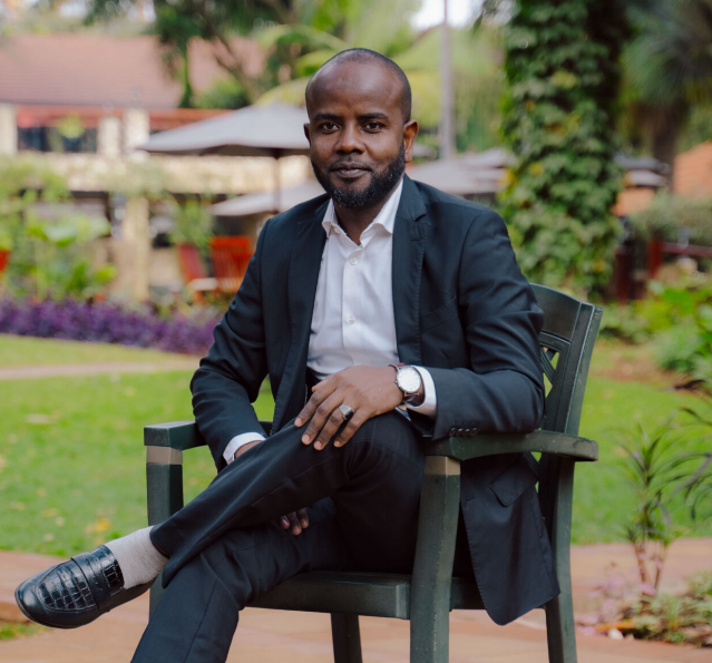 man sitting on chair and posing 