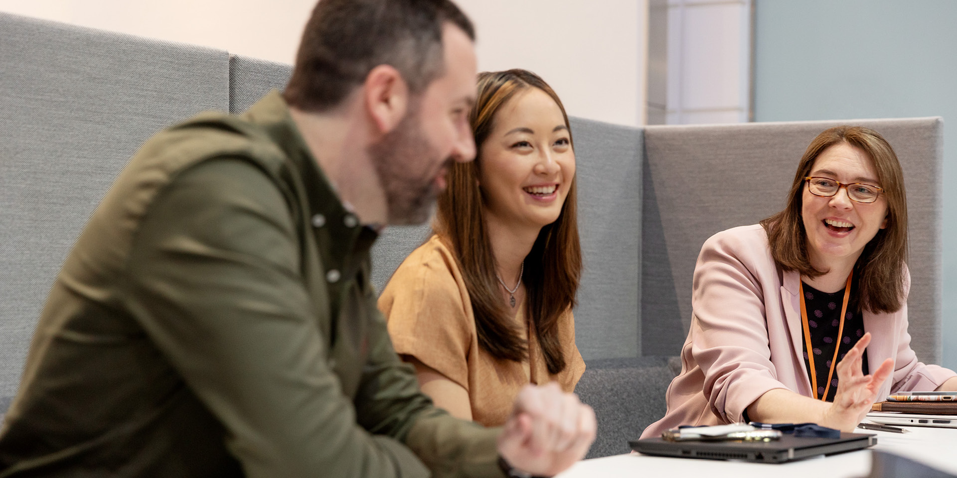 Group of employees laughing