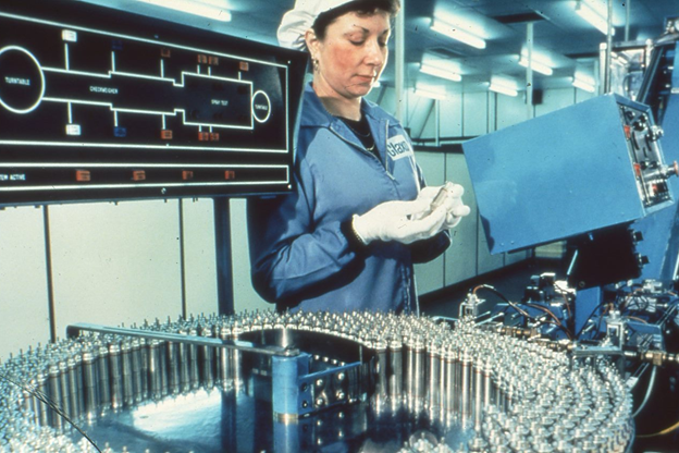 Checking filled aerosols for metered dose inhalers at Ware, UK, 1980s