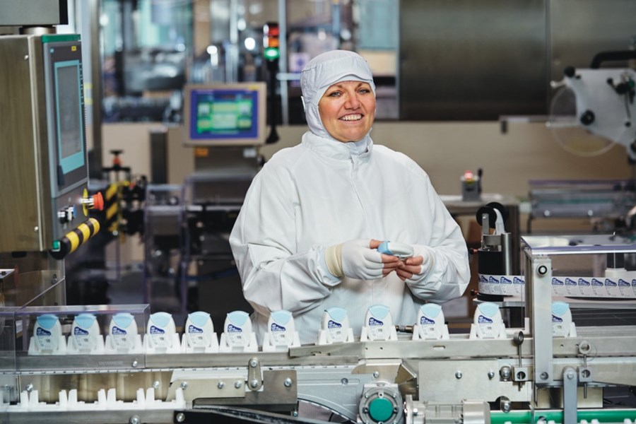 Worker on production line