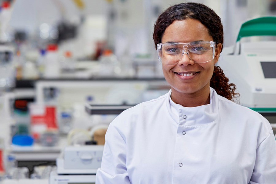 Woman smiling in lab