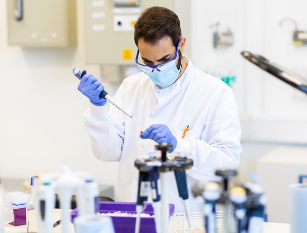 Lab worker performing an experiment