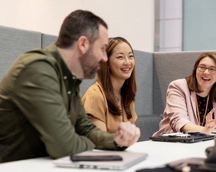annual report 2022 pdf Colleagues laughing