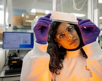 Scientist examining a card