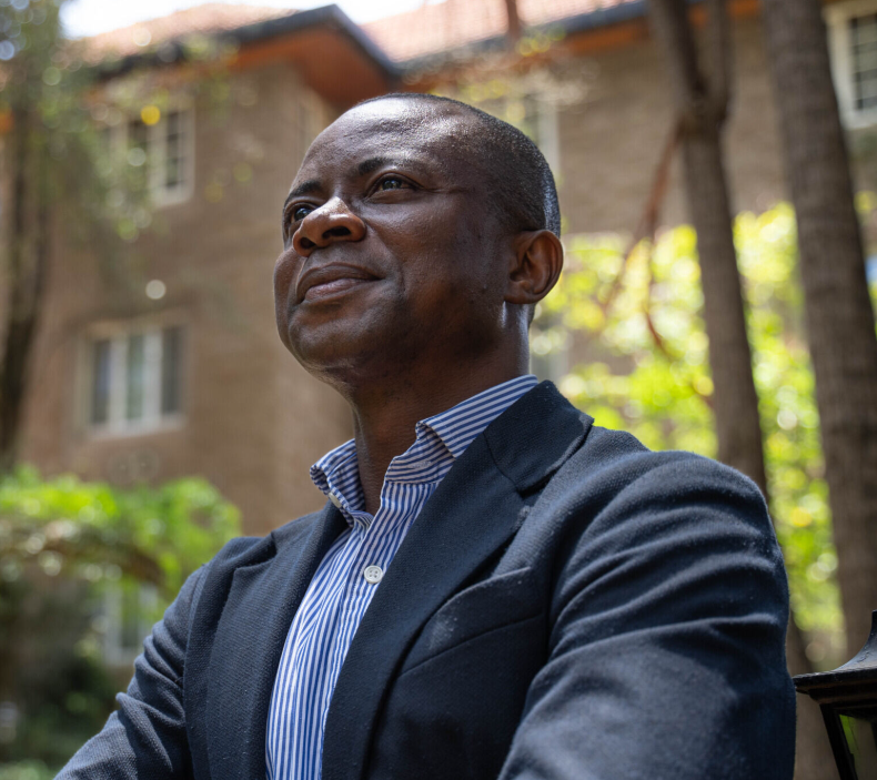 man posing and looking away from the camera