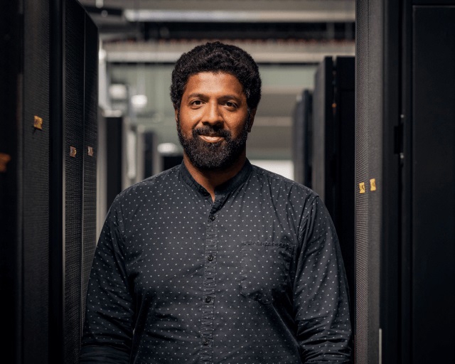 man standing and facing the camera