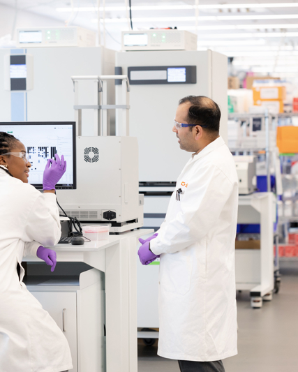 USA lab wide shot of two people working in lab