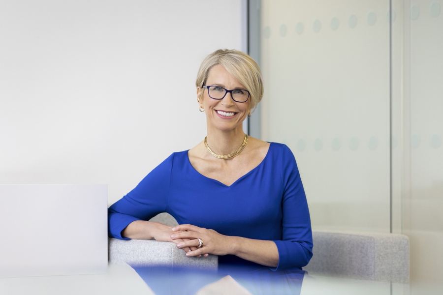 Emma Walmsley in a blue dress