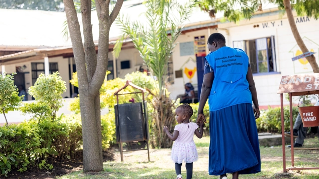 Adult and toddler in Kenya