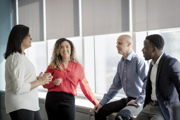 Leadership team members chatting