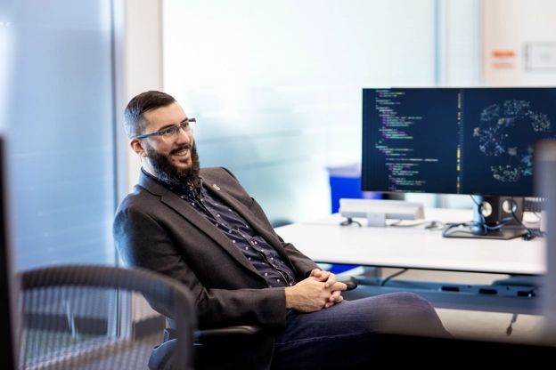 smiling man in an office