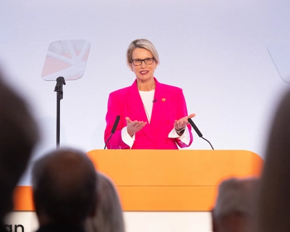 GSK CEO Emma Walmsley speaks at podium during 2024 AGM