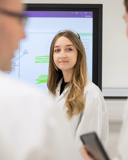 Lab workers collaborating