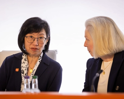 GSK Board members Jeannie Lee and Liz McKee Anderson speak to each other