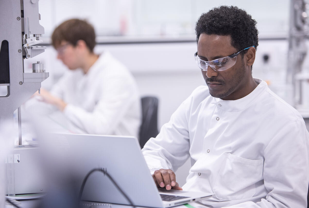 Scientist working on a laptop