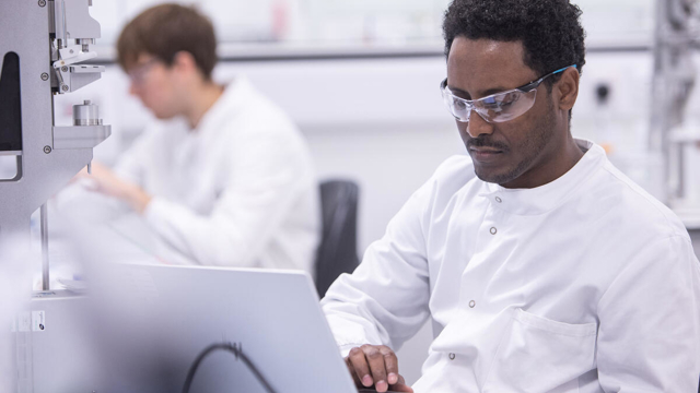 Scientist working on a laptop