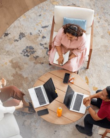 three coworkers around a table