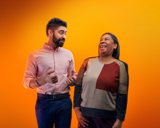 Two colleagues smiling