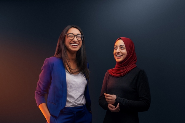 Two people smiling