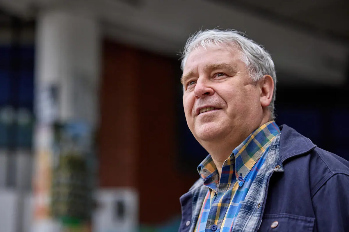 COPD patient wearing blue jacket