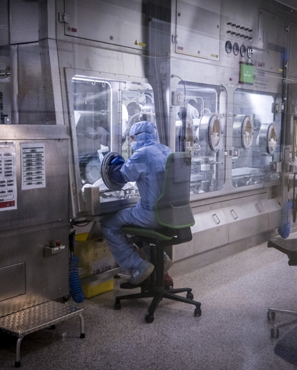Scientist works in a futurist vaccine laboratory for GSK