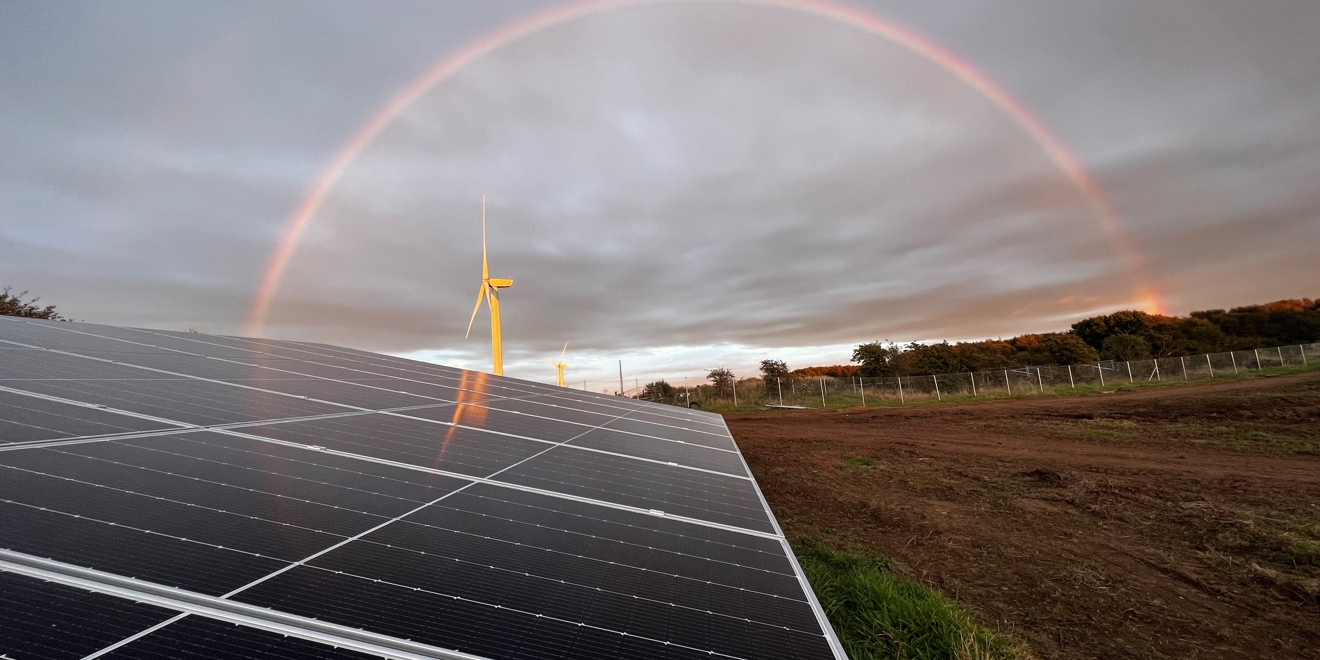 Solar panels with a rainbow in Irvine