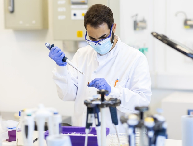 Lab worker performing an experiment