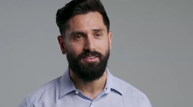 Aaron on a grey background