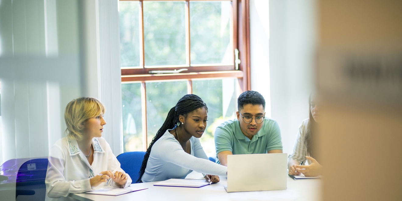 GSK early talent working at a laptop