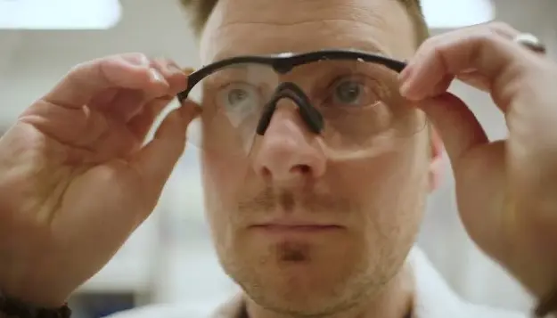 Zack putting on safety glasses