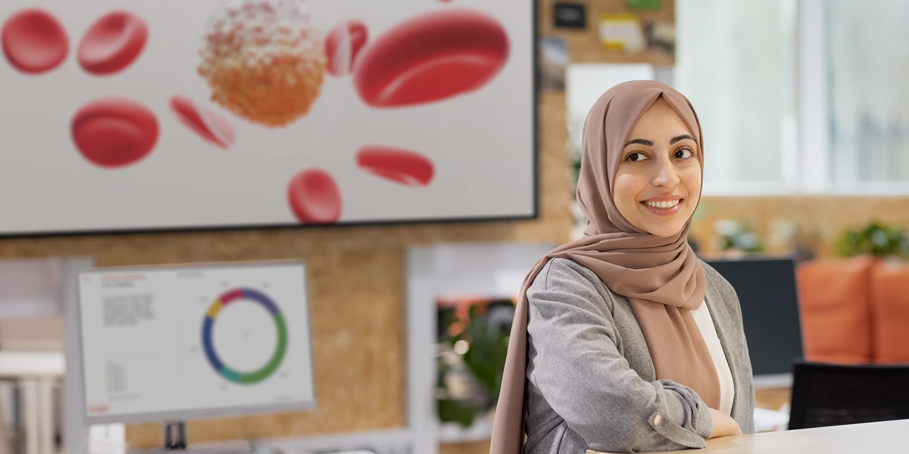 GSK employee sat smiling