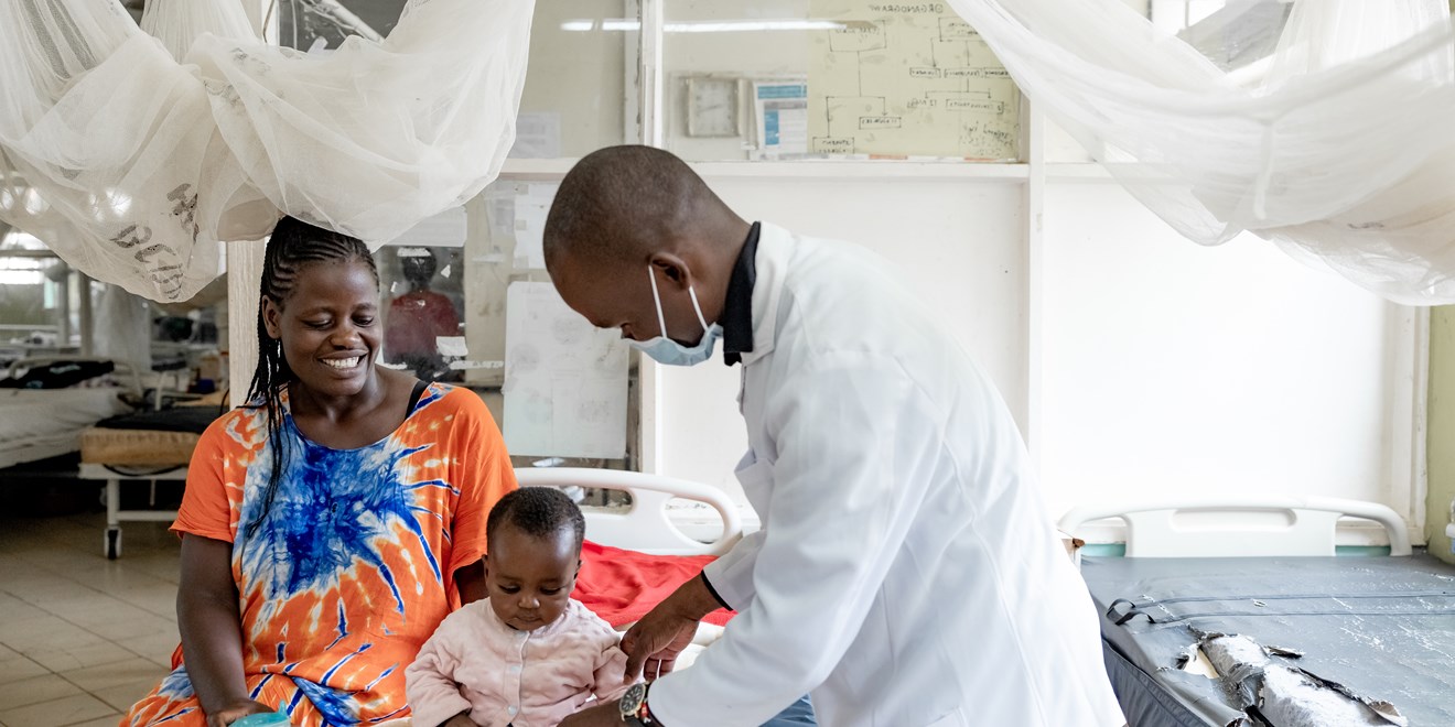 Prisca and her baby Daniel in the malaria ward
