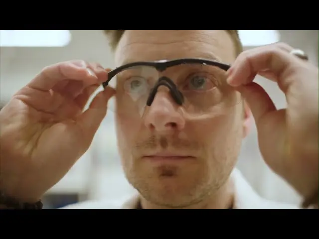 close up of man wearing safety glasses