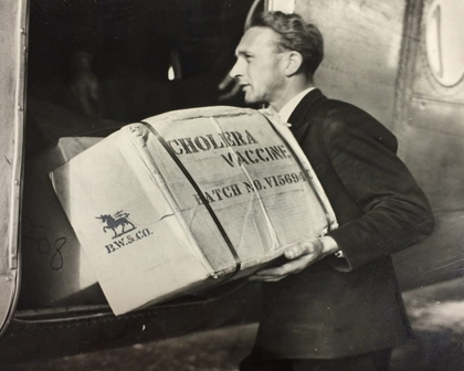 Cholera vaccines being loaded onto a plane during the 1947 epidemic