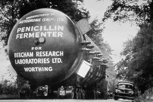 Deep culture fermentation tank on the way to be installed at Worthing, 1960s