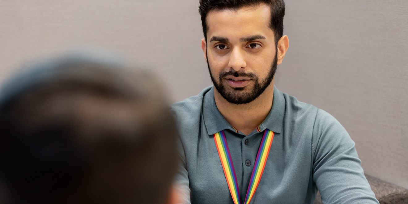 Man in conversation