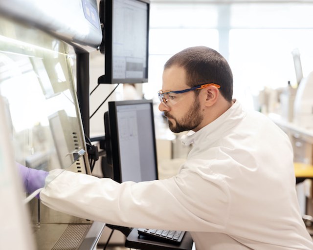 Scientist Testing Biological Samples cover