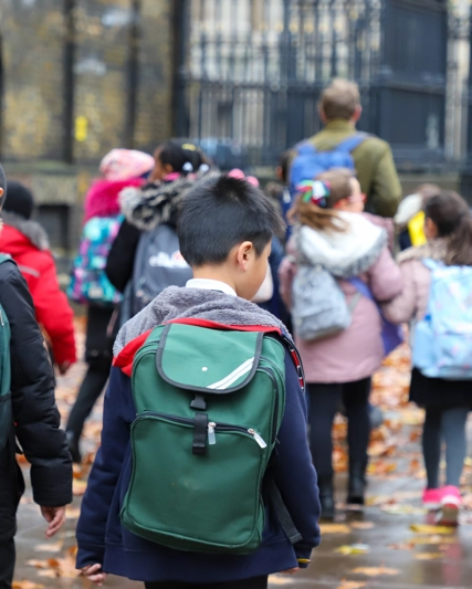 School children walking outside