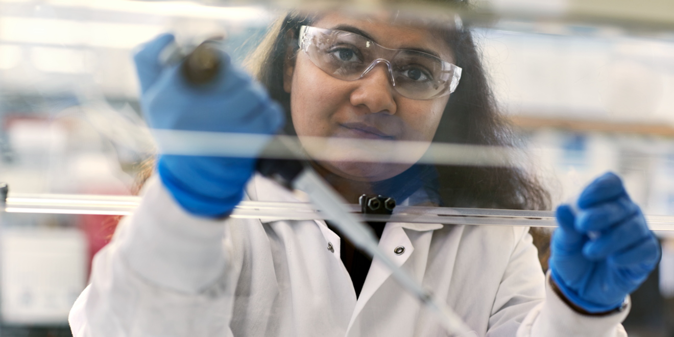 ViiV scientist uses test tube