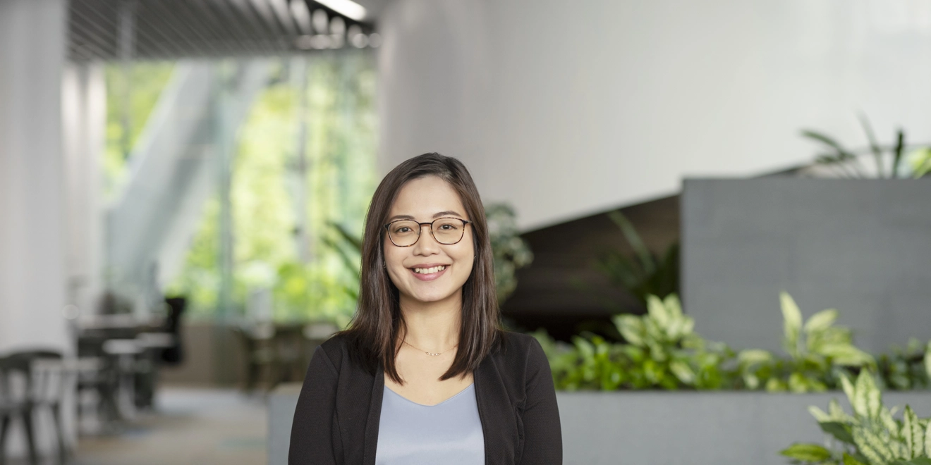 A person smiling in the office