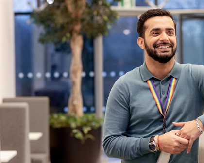 Man smiling in an office