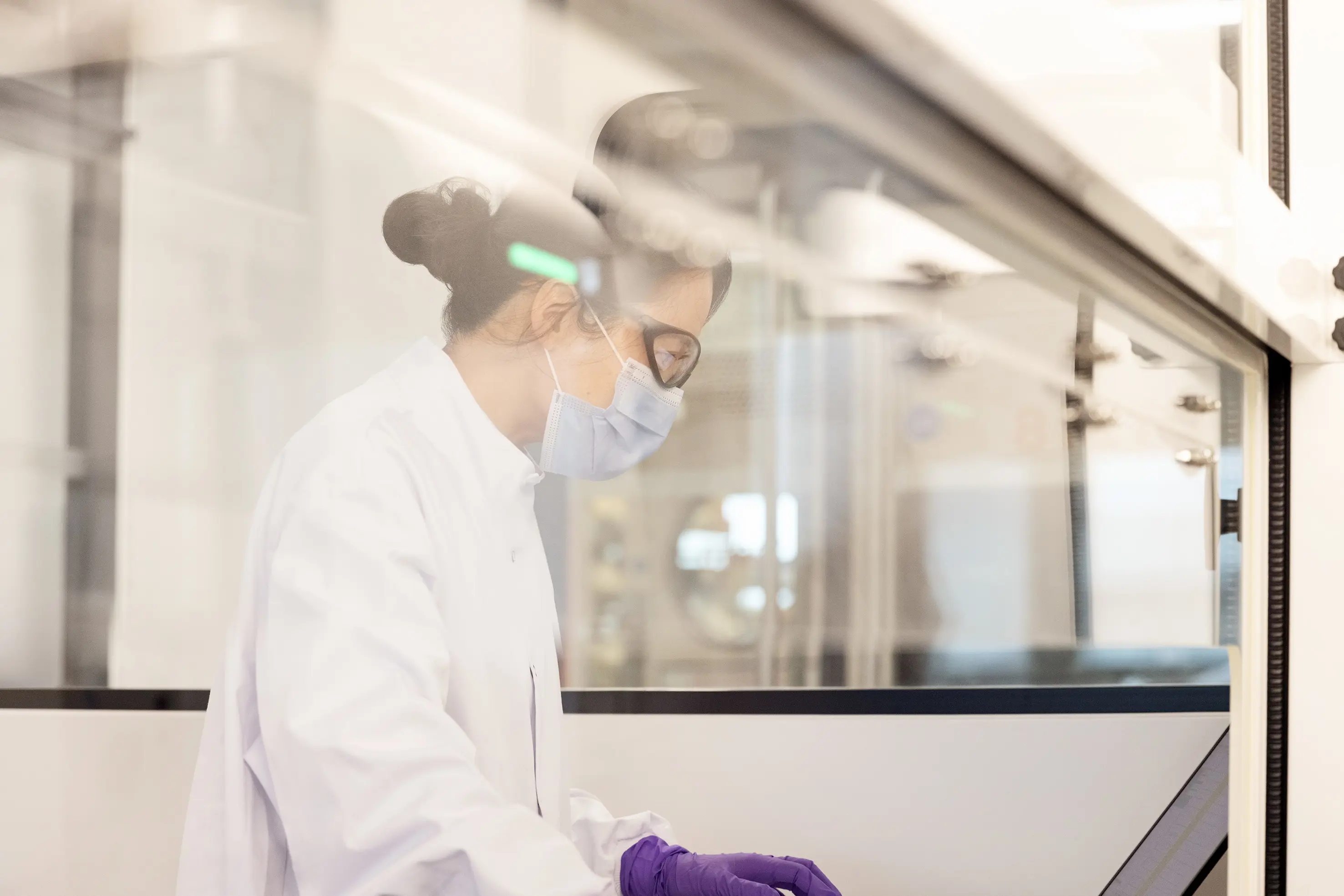 Scientist looking at screen