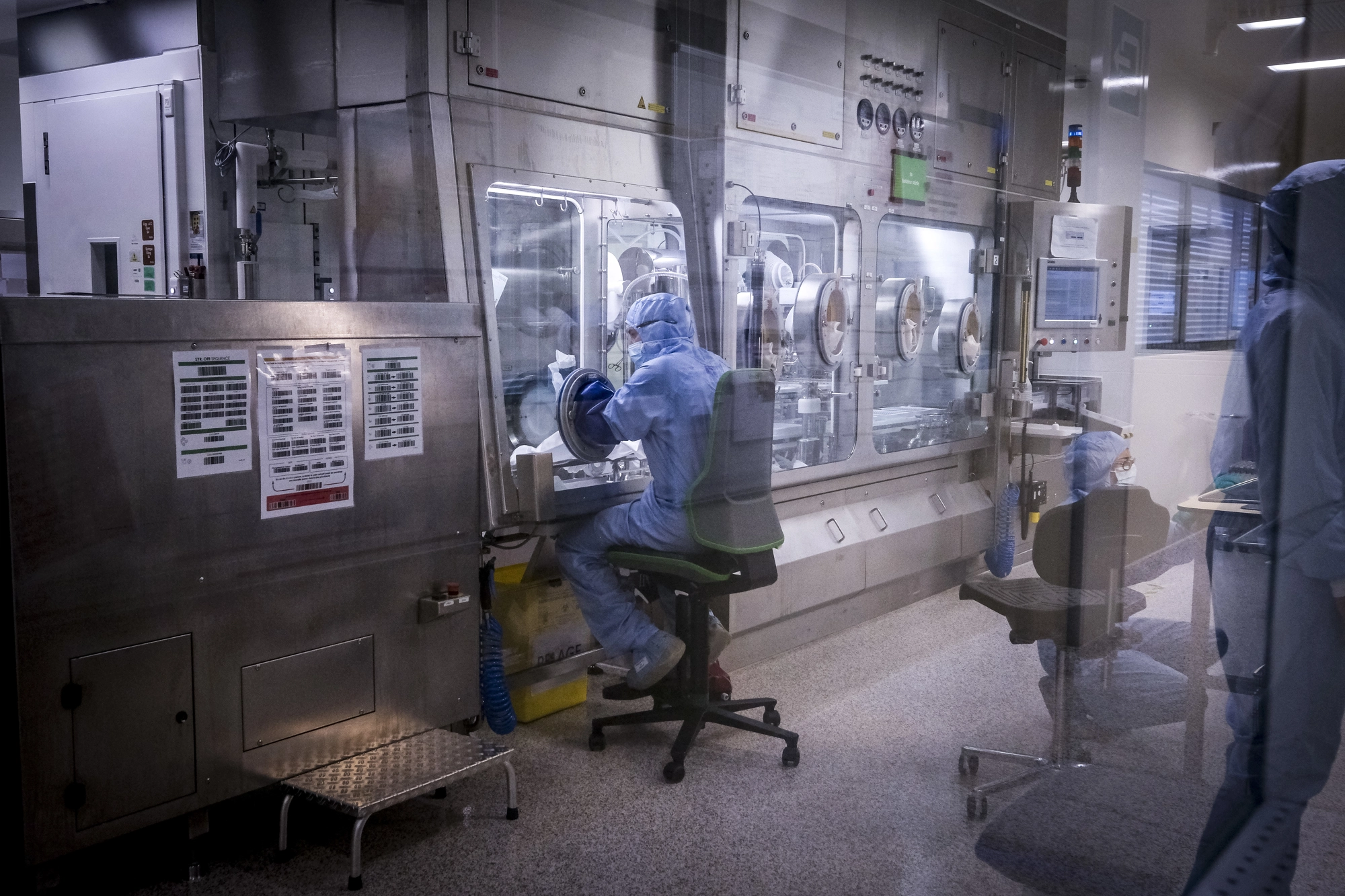 Scientist works in a futurist vaccine laboratory for GSK