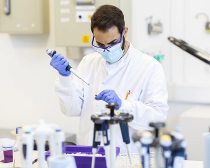Lab worker performing an experiment