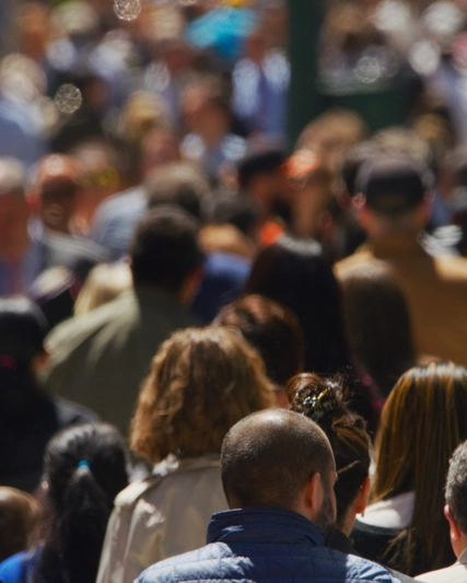 Crowd of people walking in a street