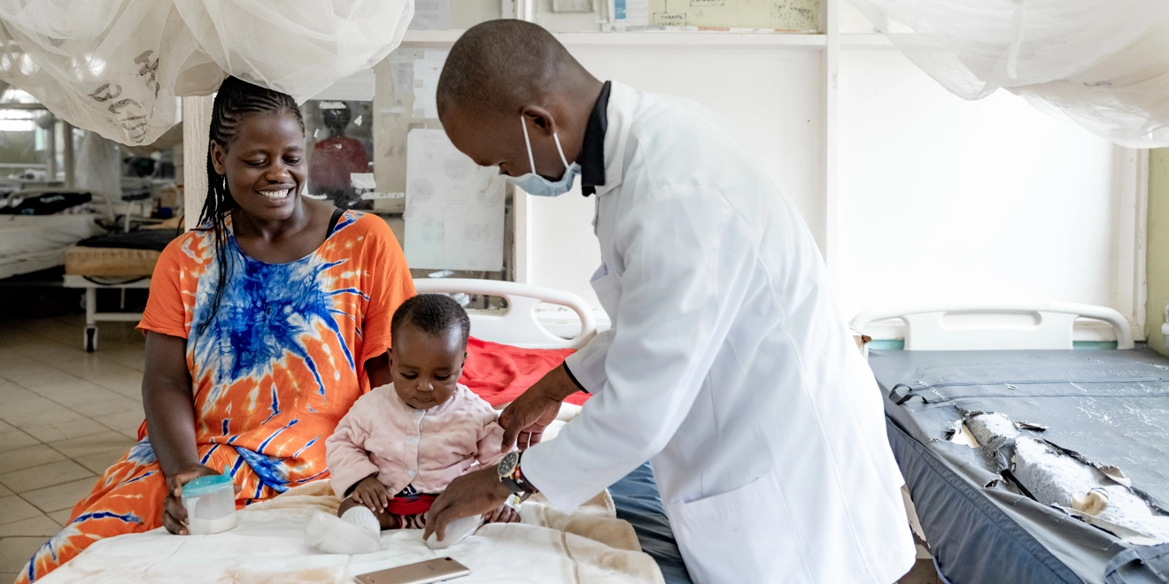 Prisca and her baby Daniel in the malaria ward